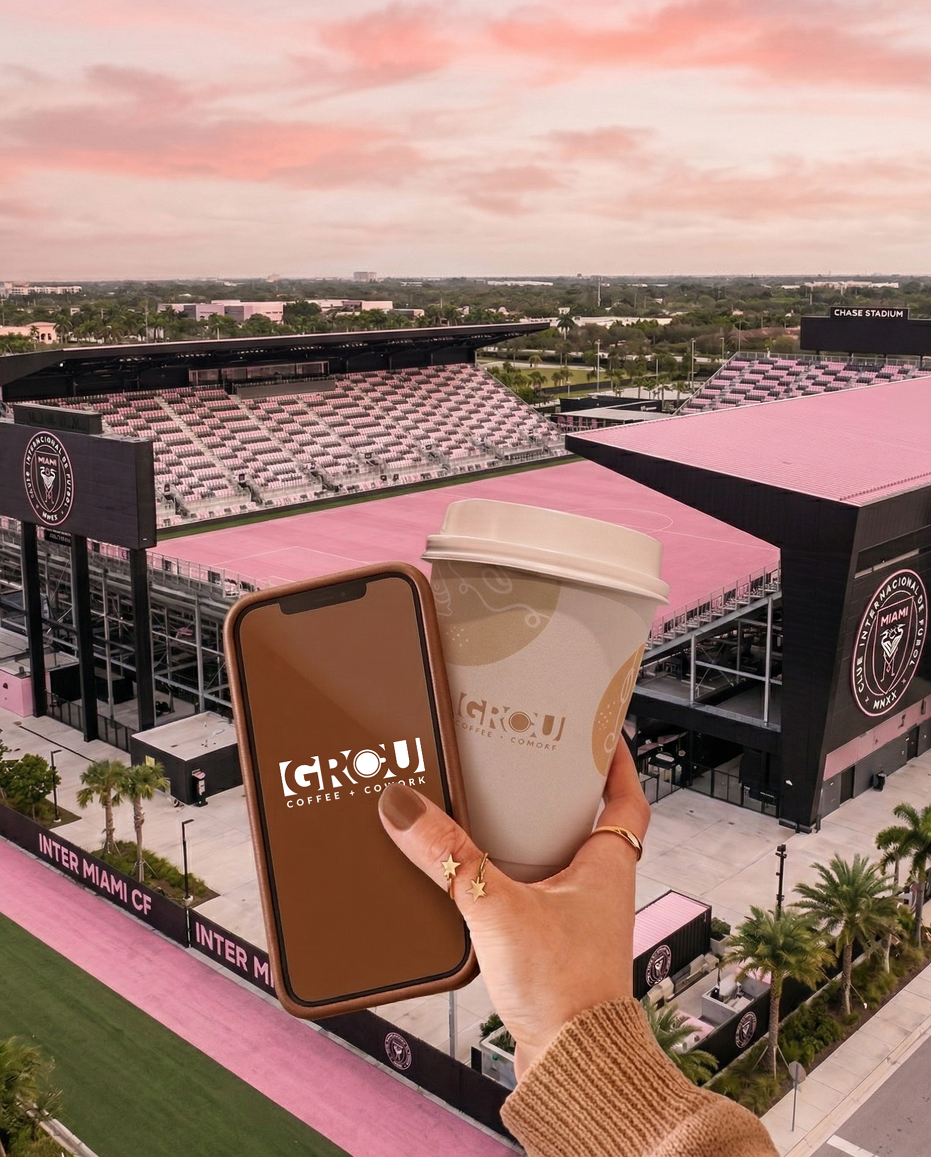Stadium view with GROU cup and phone